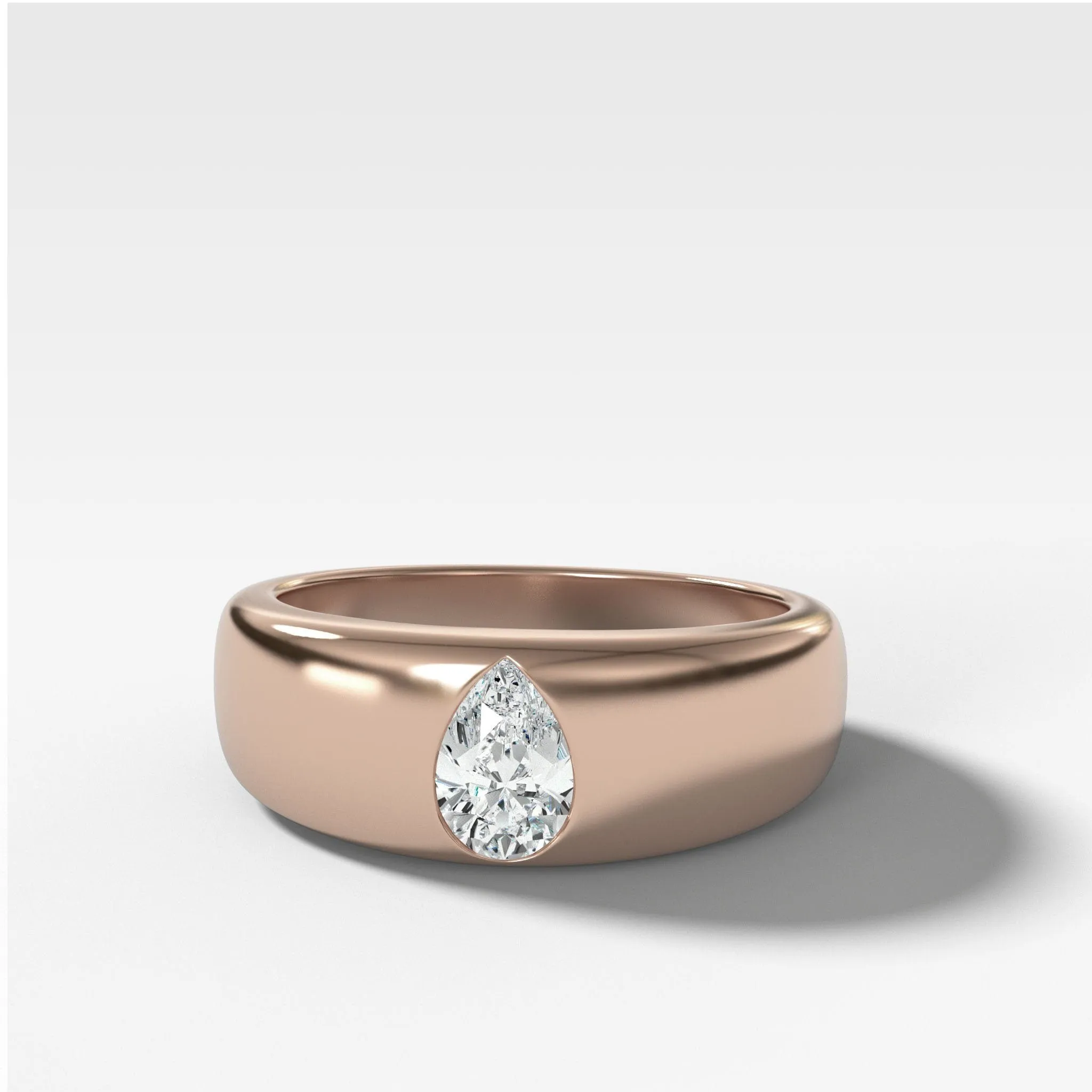 Chunky Burnished Ring with a Pear Cut