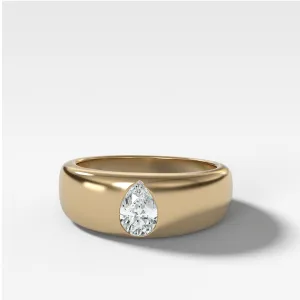 Chunky Burnished Ring with a Pear Cut
