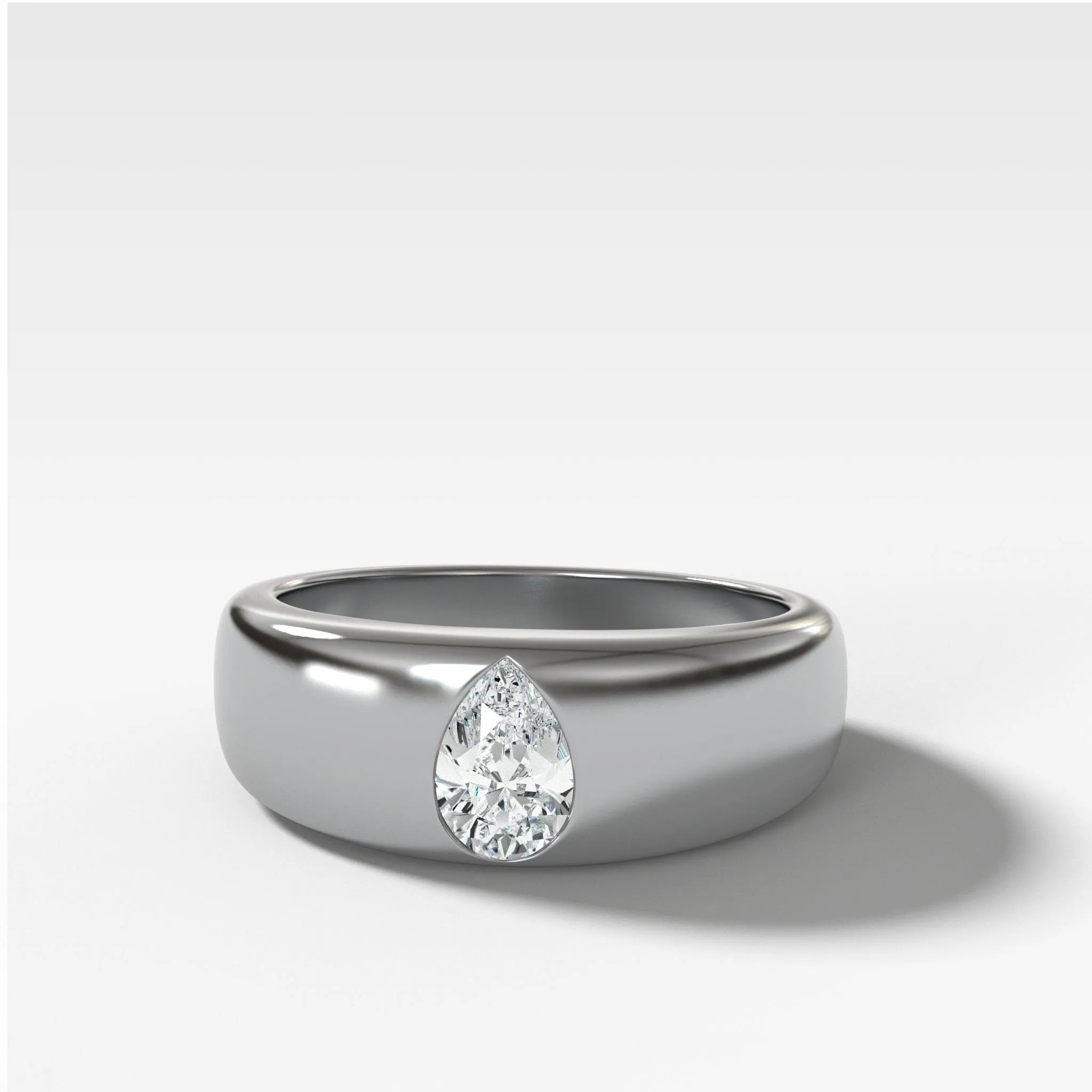 Chunky Burnished Ring with a Pear Cut