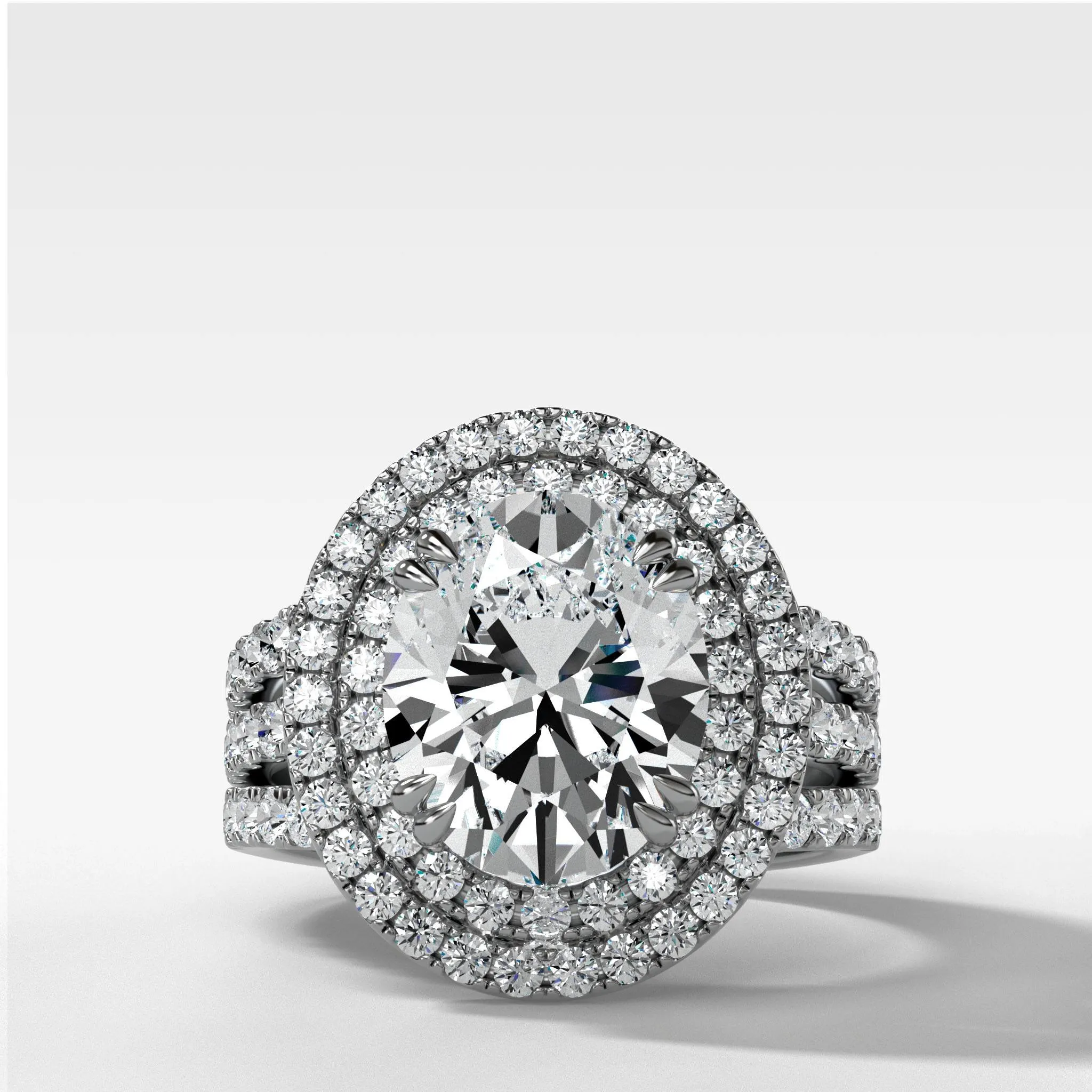 Double Halo Triple Shank Engagement Ring With Oval Cut Diamond