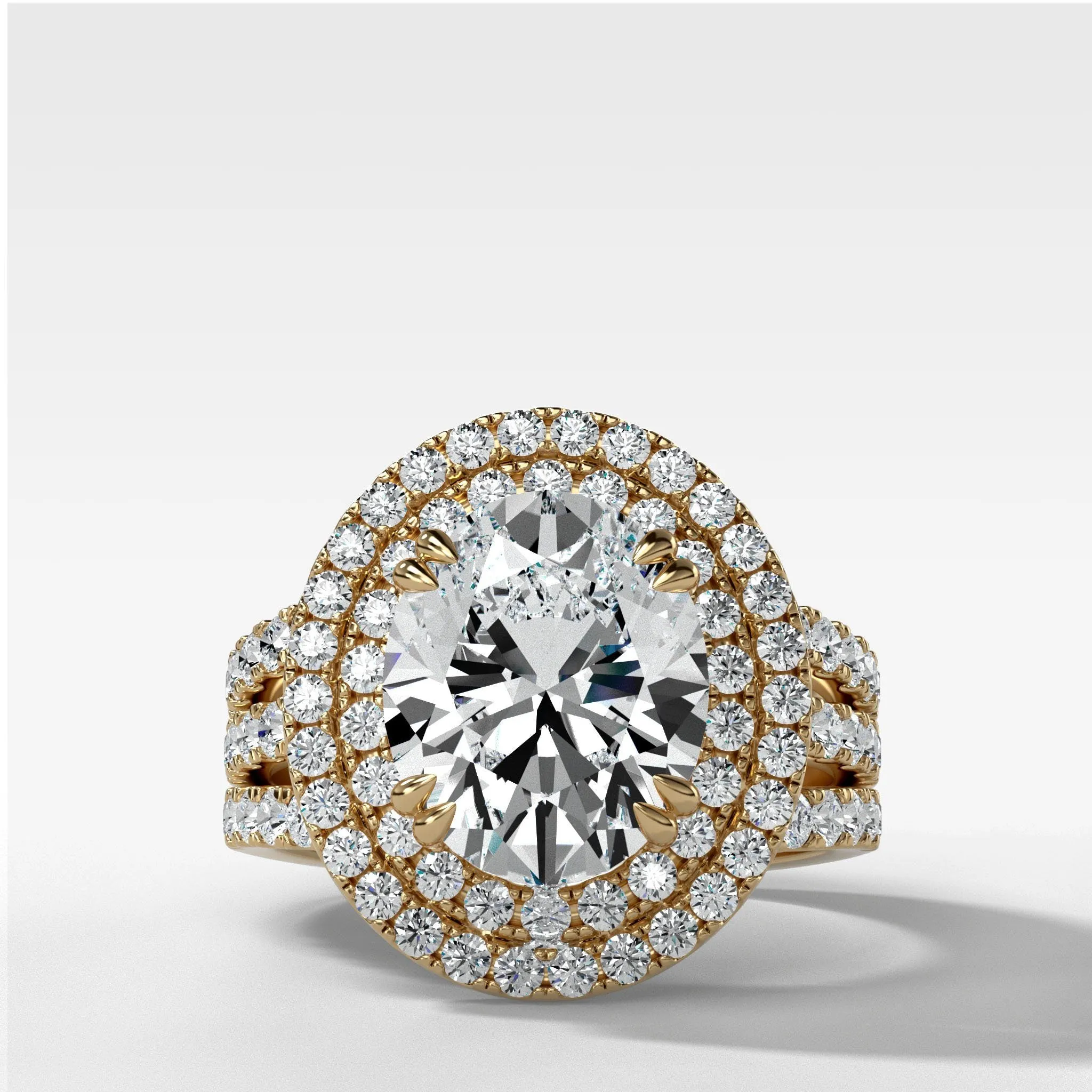 Double Halo Triple Shank Engagement Ring With Oval Cut Diamond