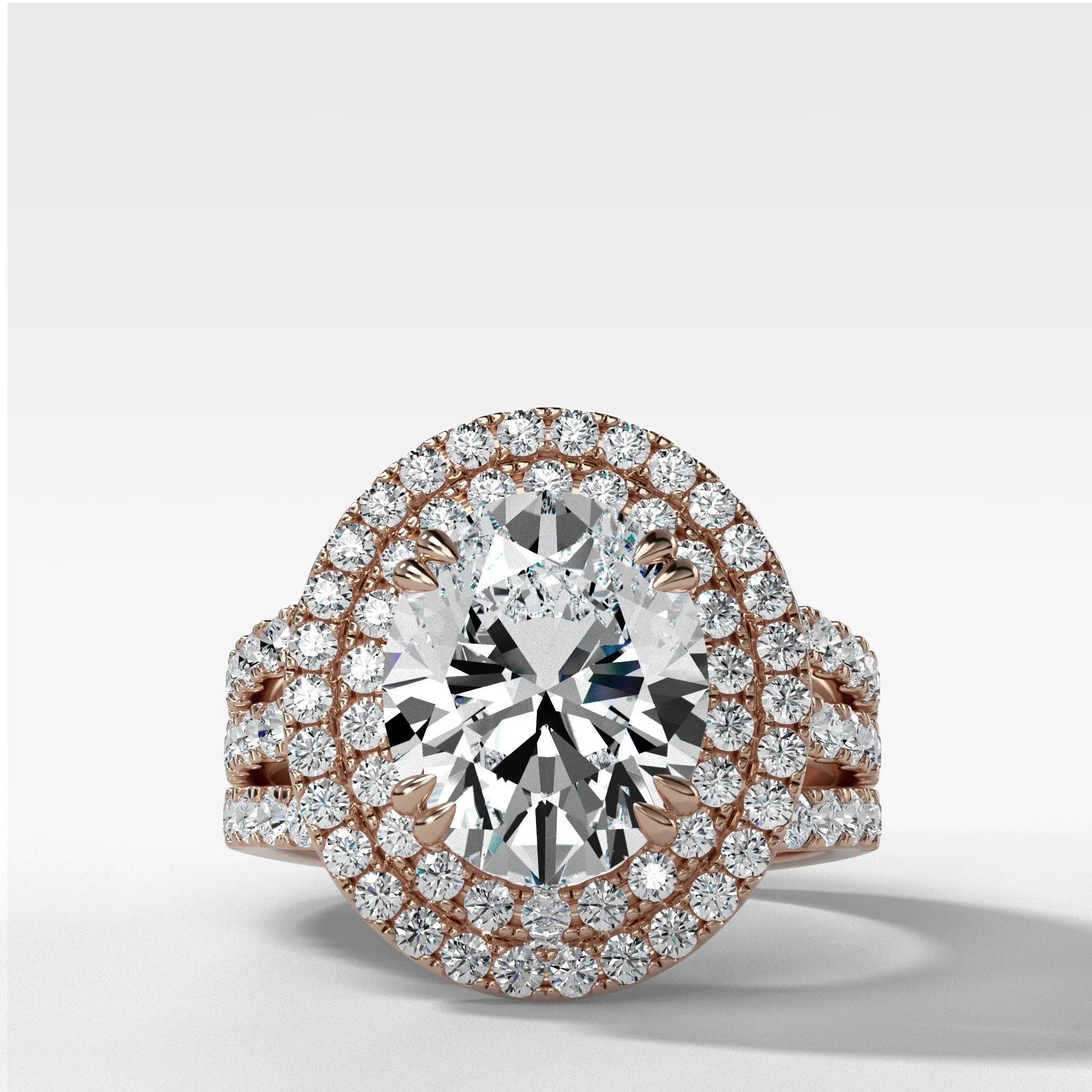 Double Halo Triple Shank Engagement Ring With Oval Cut Diamond