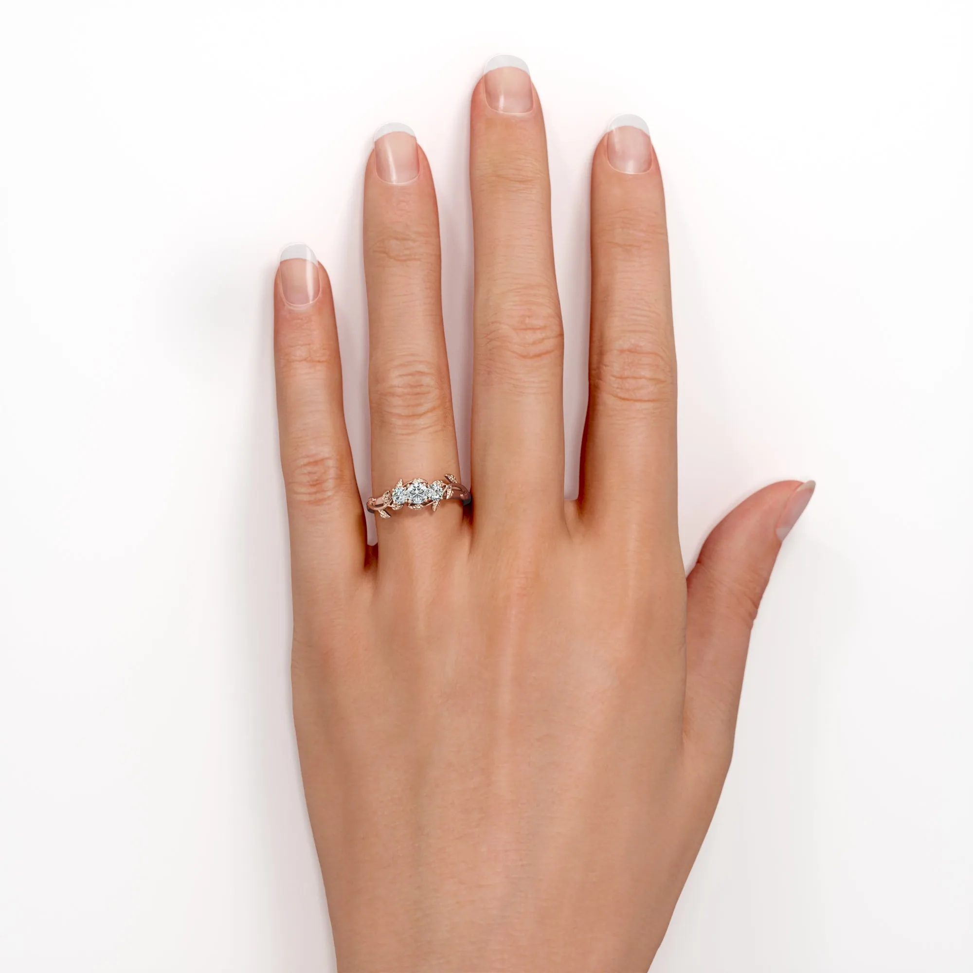 Nature inspired Three stone Round cut 0.49 carat Diamond Engagement ring in Gold