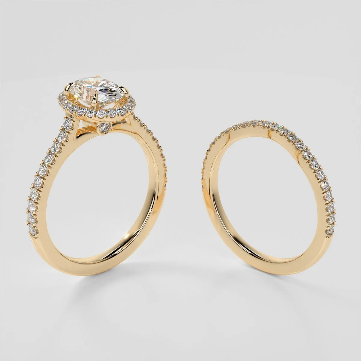 Oval Cut Halo Wedding Set With Accents