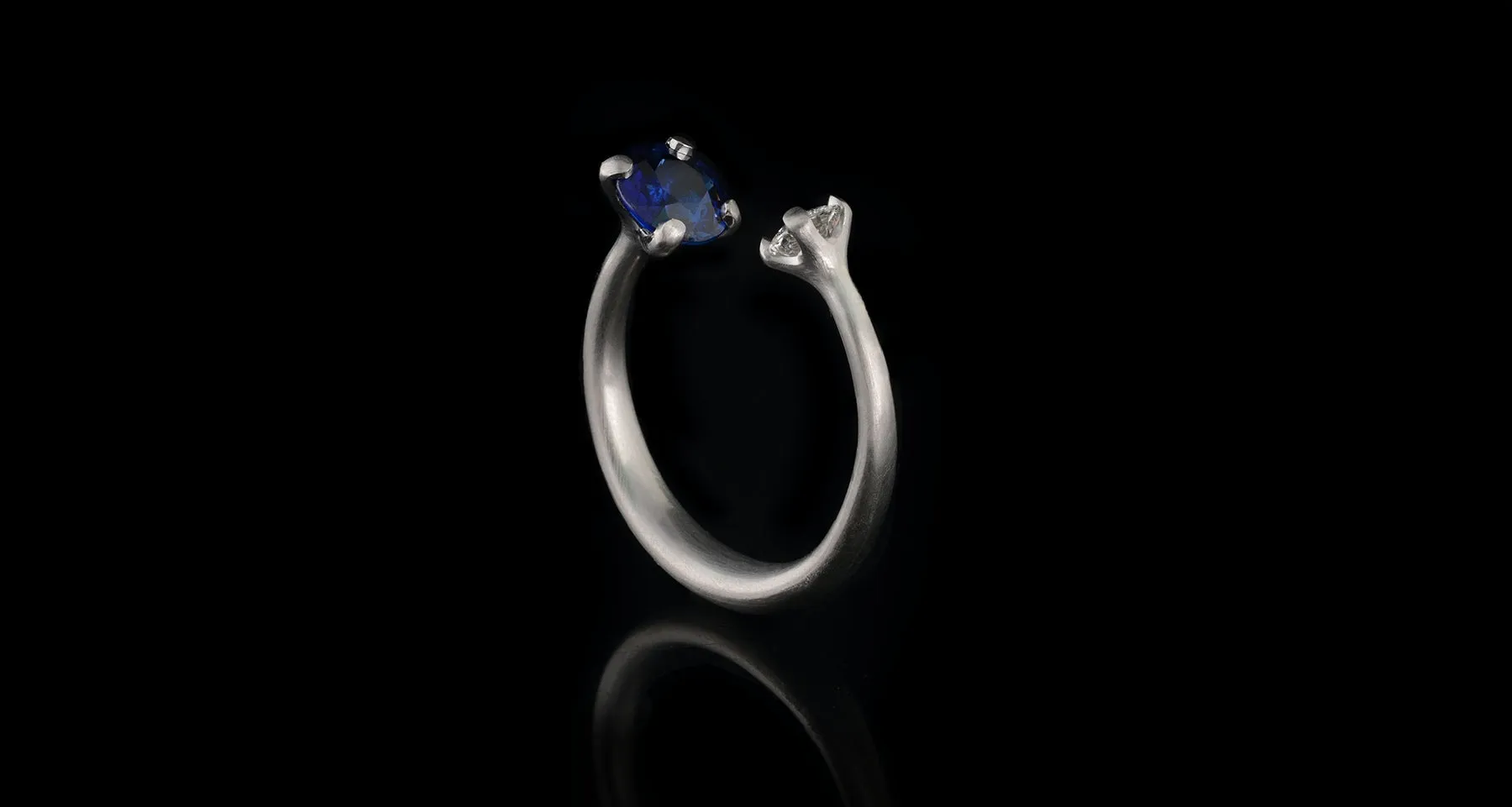 Platinum two-stone sapphire and diamond engagement ring