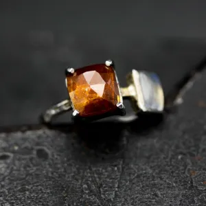 Square orange kyanite ring in silver bezel and prongs setting with Moonstone on the side on sterling silver texture band