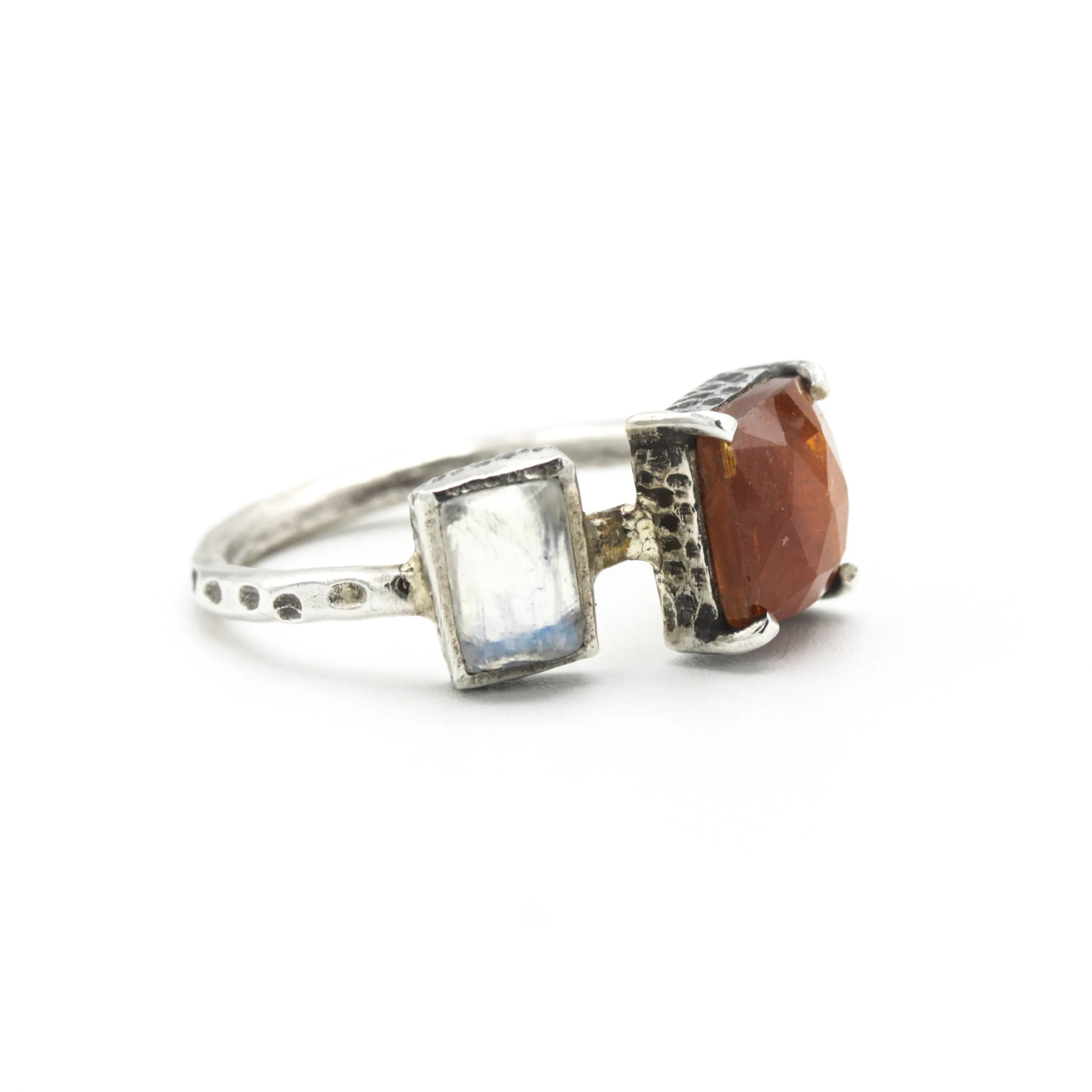 Square orange kyanite ring in silver bezel and prongs setting with Moonstone on the side on sterling silver texture band